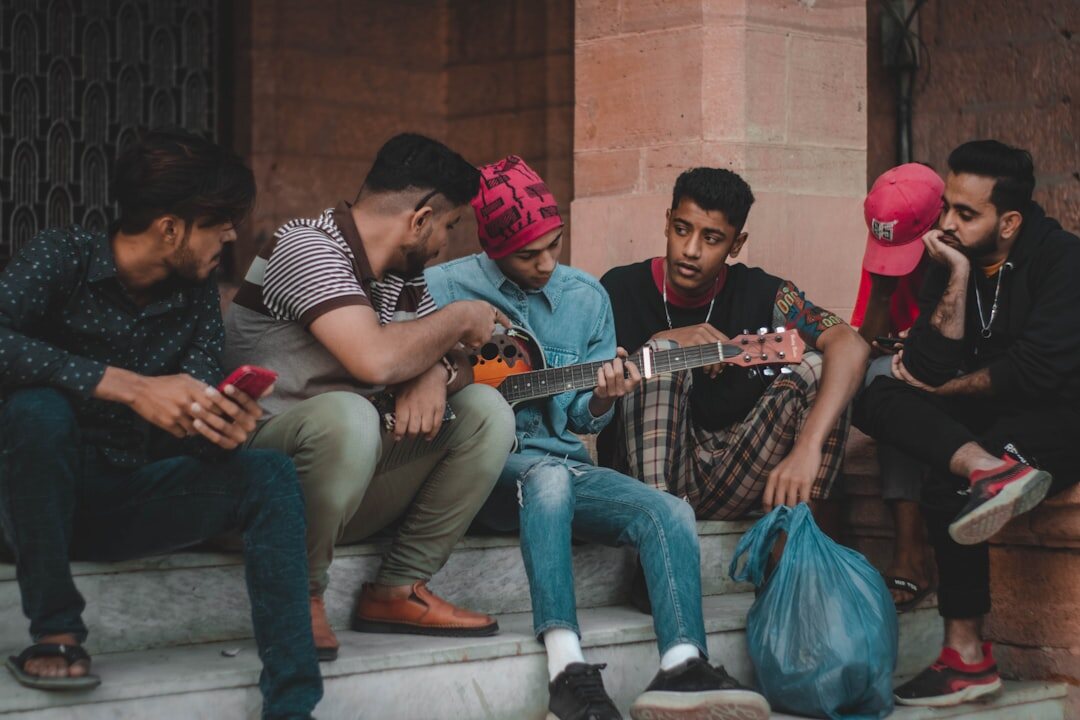 group of teens on smartphones