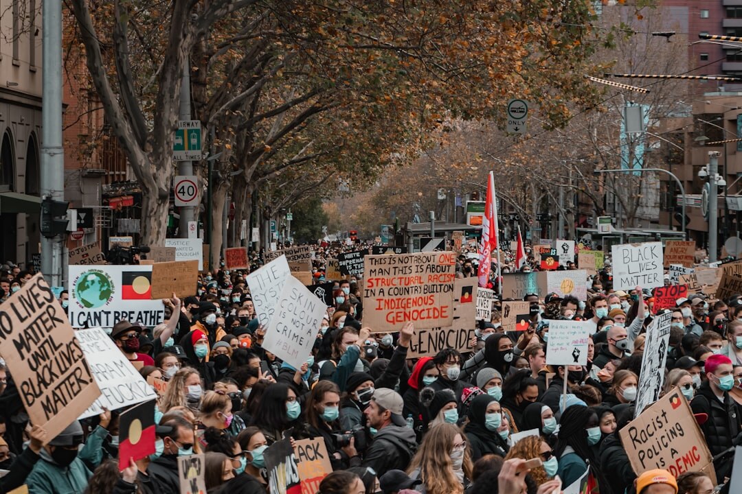 protesters holding signs